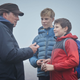Joe Cornish on the set of The Kid Who Would Be King, along with Louis Serkis and Tom Taylor.